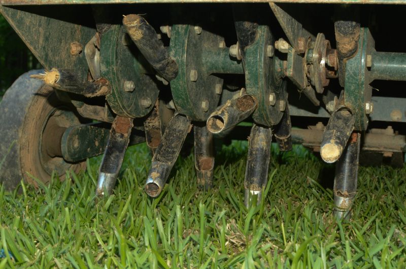 Aeration Tines Penetrating Soil